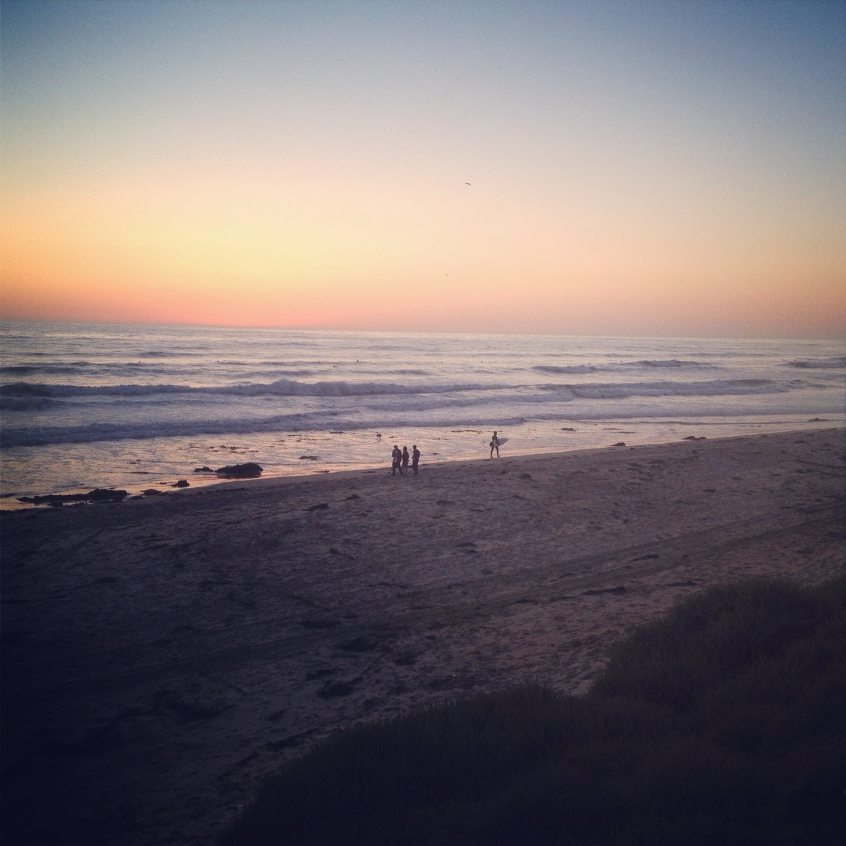 Watching the sun set at the beach is one of best free things to do in San Diego
