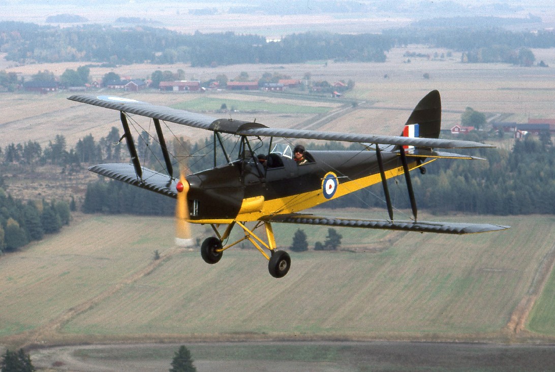 Flying a Tiger Moth is one of the more unique experiences you can have in the UK ... photo by CC user Towpilot on wikipedia.org